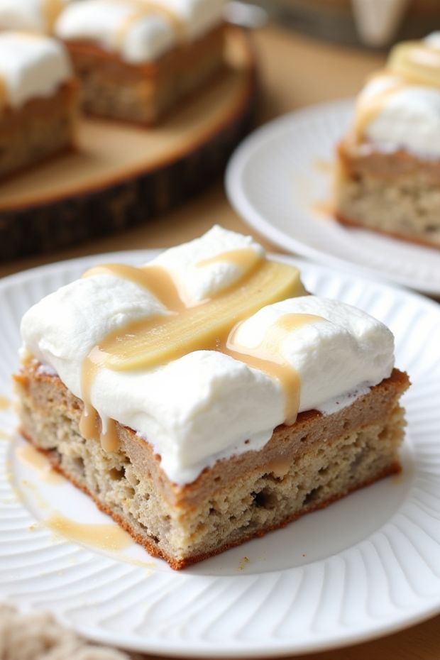 Classic Banoffee Pie Cake Slices with bananas, creamy toffee, and whipped cream topping.