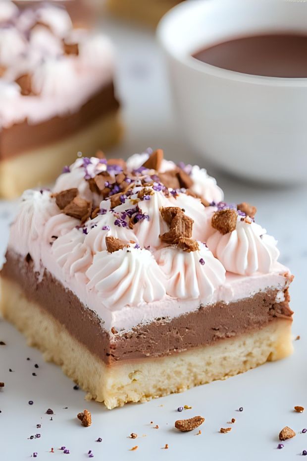 Lavender Hot Cocoa Pastry Bars with chocolate cream, marshmallow fluff on a shortbread base, perfect for any occasion.