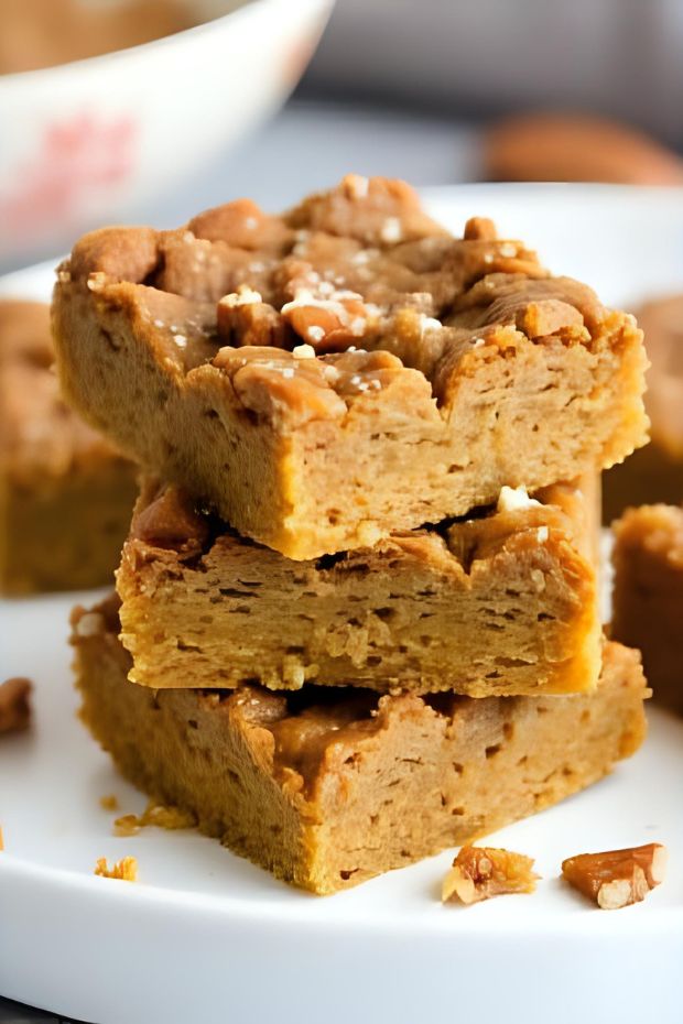 Chewy pumpkin maple pecan squares showcasing autumn flavors in a delicious plant-based dessert.